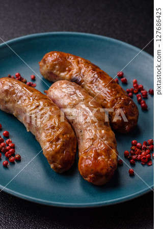 Grilled pork or beef sausages Grilled pork or beef sausages 127686425