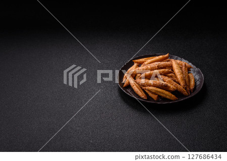 Cinnamon flavored biscuits or breadsticks 127686434