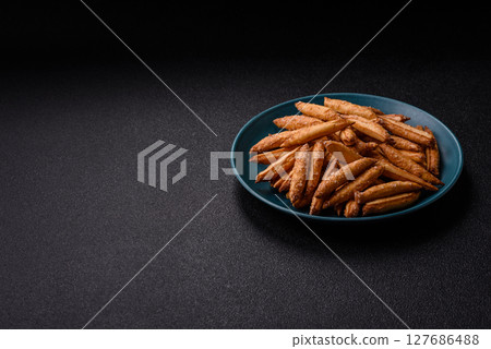 Cinnamon flavored biscuits or breadsticks Cinnamon flavored biscuits or breadsticks 127686488