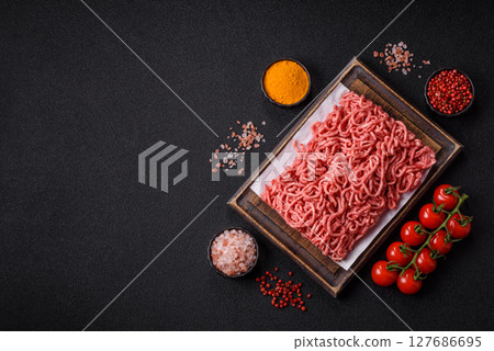 Ground beef mince fresh raw with salt and spices Ground beef mince fresh raw with salt and spices 127686695