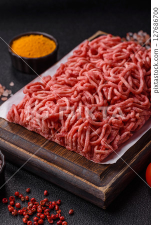 Ground beef mince fresh raw with salt and spices Ground beef mince fresh raw with salt and spices 127686700