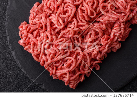 Ground beef mince fresh raw with salt and spices Ground beef mince fresh raw with salt and spices 127686714