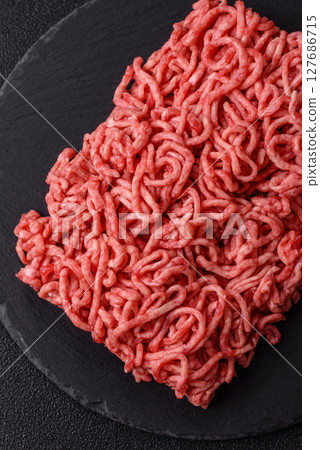 Ground beef mince fresh raw with salt and spices Ground beef mince fresh raw with salt and spices 127686715