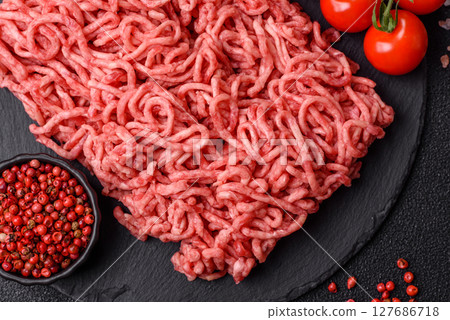 Ground beef mince fresh raw with salt and spices Ground beef mince fresh raw with salt and spices 127686718