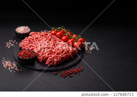 Ground beef mince fresh raw with salt and spices 127686721