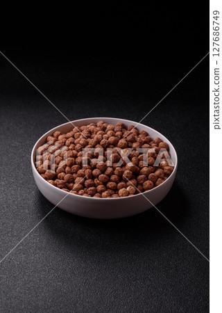 Cereal chocolate corn balls in a bowl Cereal chocolate corn balls in a bowl 127686749