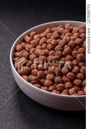 Cereal chocolate corn balls in a bowl 127686753