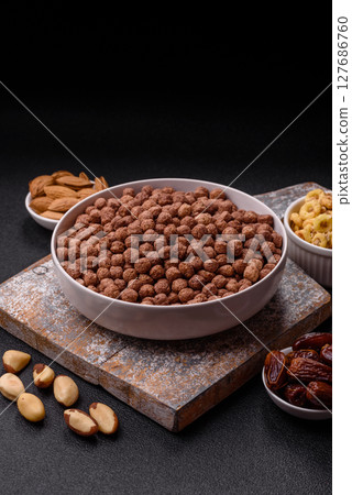 Cereal chocolate corn balls in a bowl 127686760