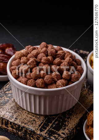 Cereal chocolate corn balls in a bowl Cereal chocolate corn balls in a bowl 127686770