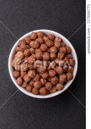 Cereal chocolate corn balls in a bowl Cereal chocolate corn balls in a bowl 127686773