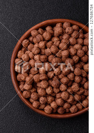Cereal chocolate corn balls in a bowl 127686784