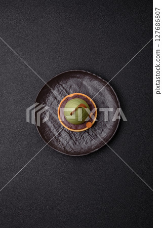 Easter sweet cake or tart in the shape of an egg 127686807