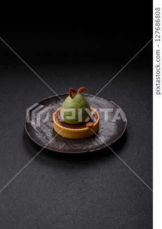 Easter sweet cake or tart in the shape of an egg 127686808