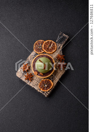 Easter sweet cake or tart in the shape of an egg Easter sweet cake or tart in the shape of an egg 127686811