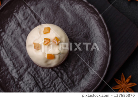 Easter sweet cake covered with icing with fruit and candied fruits Easter sweet cake covered with icing with fruit and candied fruits 127686870