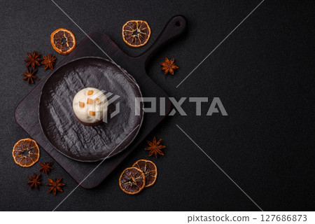 Easter sweet cake covered with icing with fruit and candied fruits Easter sweet cake covered with icing with fruit and candied fruits 127686873