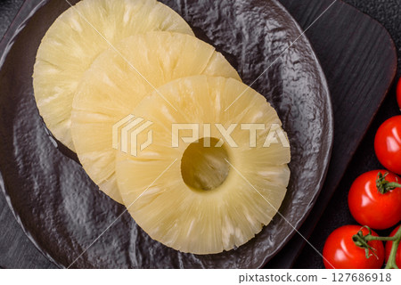 Tropical fruit pineapple in rings or slices tinned sweet 127686918