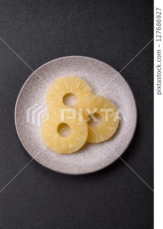 Tropical fruit pineapple in rings or slices tinned sweet Tropical fruit pineapple in rings or slices tinned sweet 127686927