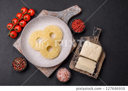Tropical fruit pineapple in rings or slices tinned sweet Tropical fruit pineapple in rings or slices tinned sweet 127686938