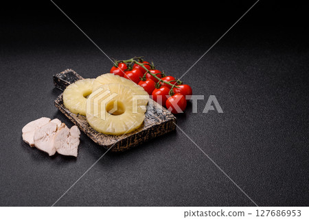 Tropical fruit pineapple in rings or slices tinned sweet Tropical fruit pineapple in rings or slices tinned sweet 127686953