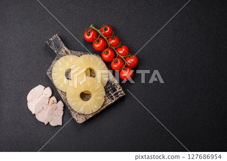 Tropical fruit pineapple in rings or slices tinned sweet Tropical fruit pineapple in rings or slices tinned sweet 127686954