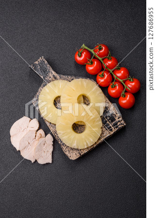 Tropical fruit pineapple in rings or slices tinned sweet Tropical fruit pineapple in rings or slices tinned sweet 127686955