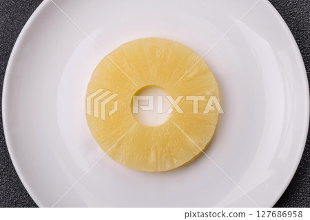 Tropical fruit pineapple in rings or slices tinned sweet 127686958