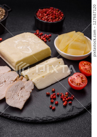 Dairy white mozzarella cheese sliced Dairy white mozzarella cheese sliced 127687120