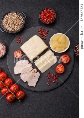 Dairy white mozzarella cheese sliced 127687123