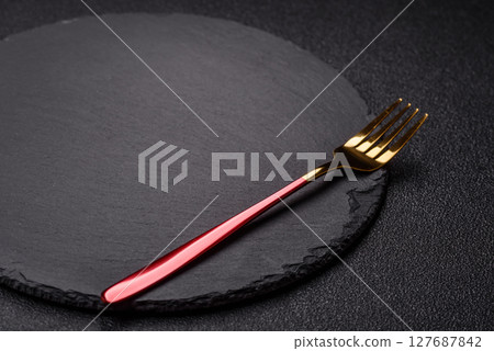 Empty plate with fork, cutlery for dinner table Empty plate with fork, cutlery for dinner table 127687842