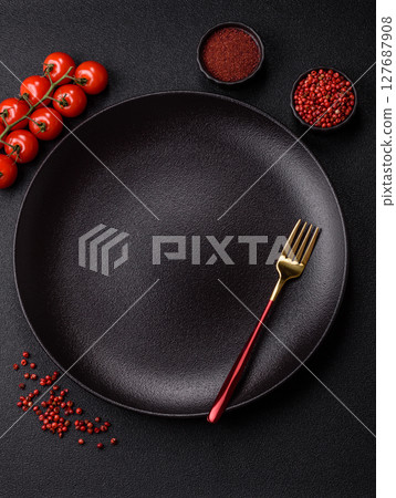 Empty plate with fork, cutlery for dinner table 127687908