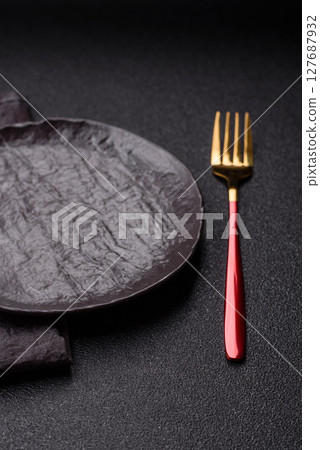 Empty plate with fork, cutlery for dinner table Empty plate with fork, cutlery for dinner table 127687932