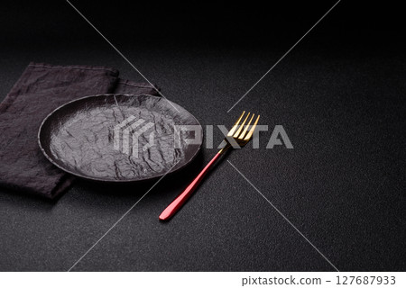Empty plate with fork, cutlery for dinner table 127687933