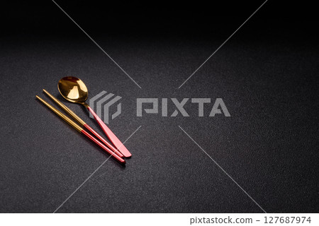 Fork, spoon, chopsticks set of kitchen utensils 127687974