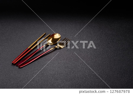 Fork, spoon, chopsticks set of kitchen utensils Fork, spoon, chopsticks set of kitchen utensils 127687978