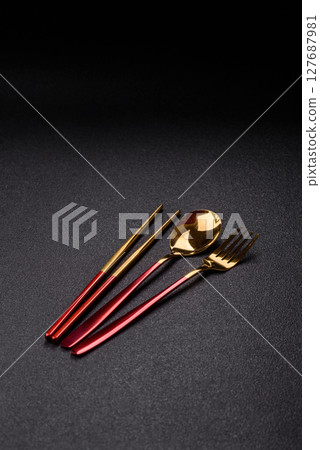 Fork, spoon, chopsticks set of kitchen utensils Fork, spoon, chopsticks set of kitchen utensils 127687981