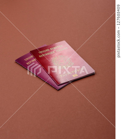 Italy passport for travelling, flying and doing business. Italian document 127688409