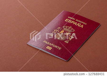 Spain passport for travelling, flying and doing business. Spanish document Spain passport for travelling, flying and doing business. Spanish document 127688431