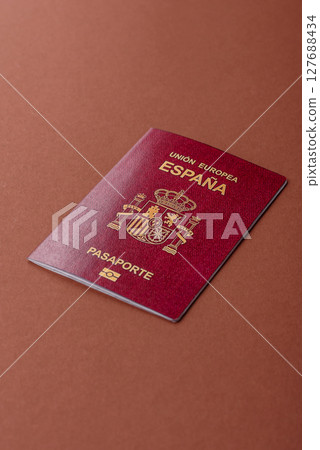 Spain passport for travelling, flying and doing business. Spanish document 127688434