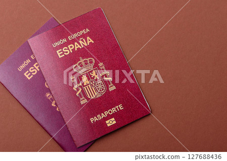 Spain passport for travelling, flying and doing business. Spanish document Spain passport for travelling, flying and doing business. Spanish document 127688436