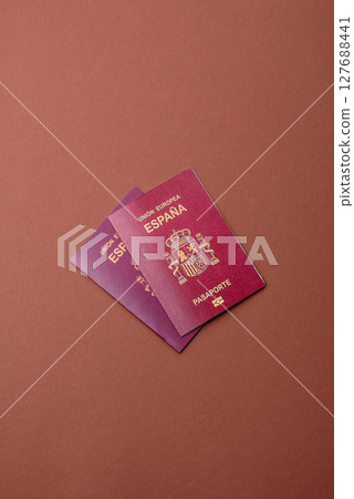 Spain passport for travelling, flying and doing business. Spanish document Spain passport for travelling, flying and doing business. Spanish document 127688441