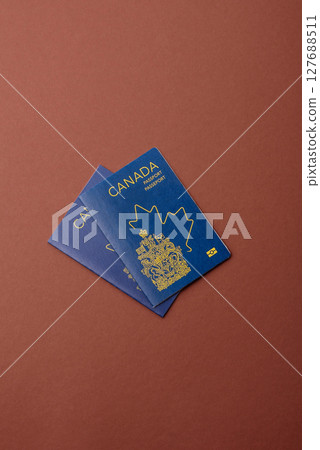 Canadian passport for travelling, flying and doing business. Canada document 127688511