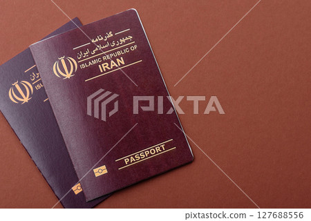 Iranian passport for travelling, flying and doing business. Iran document Iranian passport for travelling, flying and doing business. Iran document 127688556