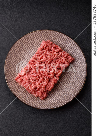 Stuffing or ground raw beef or pork with salt and spices Stuffing or ground raw beef or pork with salt and spices 127688746