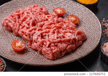 Stuffing or ground raw beef or pork with salt and spices Stuffing or ground raw beef or pork with salt and spices 127688751