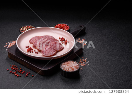 Sliced salami sausage, smoked meat, delicious deli snacks 127688864