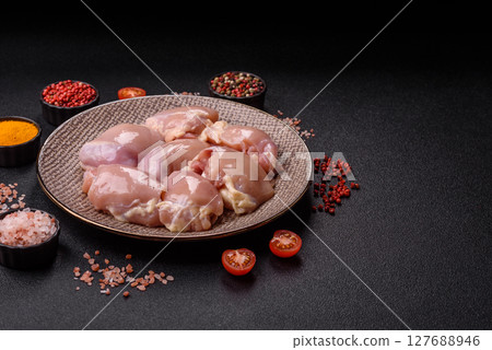 Chicken thigh fillet raw, skinless, boneless, poultry legs Chicken thigh fillet raw, skinless, boneless, poultry legs 127688946