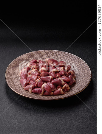 Chicken raw heart, red duck or turkey internal organs as an ingredient 127689034