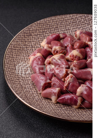 Chicken raw heart, red duck or turkey internal organs as an ingredient 127689038