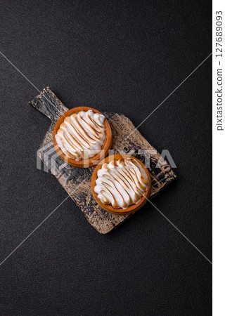 Lemon tart, meringue pie or fruit cream tart 127689093